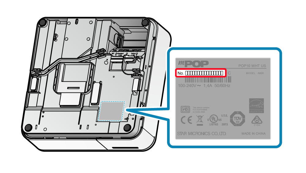 It is a standard printed seal in which the number starts with No., and it is located to the front of the underside of the main unit.  